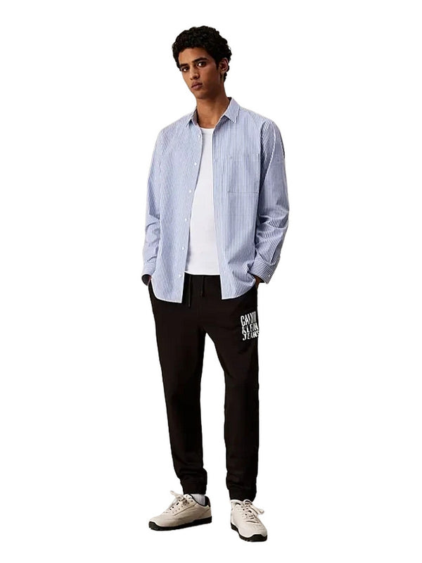 Pantaloni Uomo Calvin Klein - Pantaloni da tuta in spugna di cotone con logo - Nero