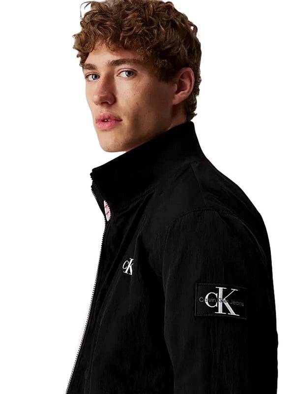 Giubbini Uomo Calvin Klein - Giubbotto strutturato con zip integrale in nylon - Nero