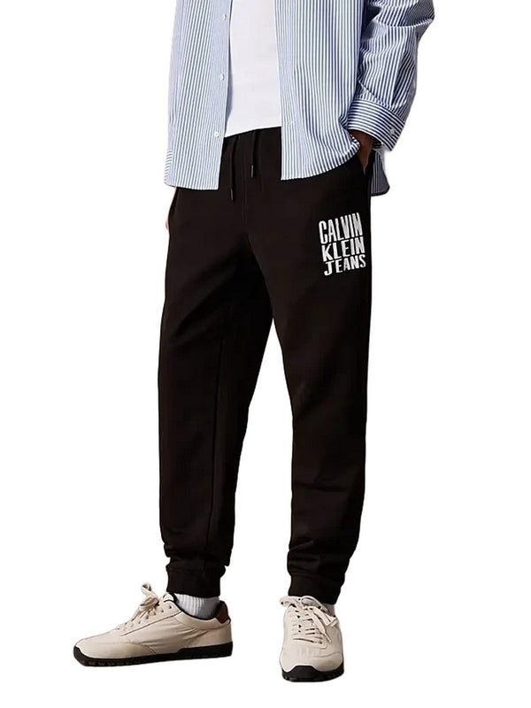 Pantaloni Uomo Calvin Klein - Pantaloni da tuta in spugna di cotone con logo - Nero