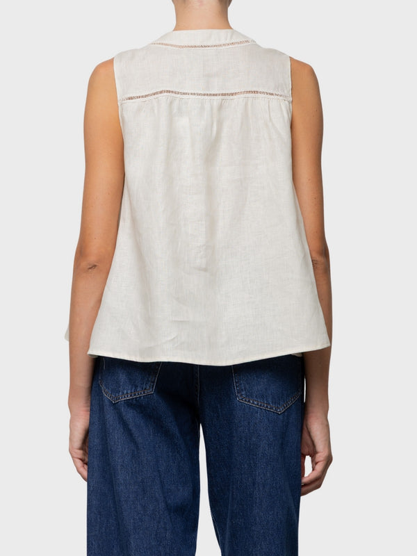 Top camicia smanicato in lino svasato con ricamo cut-out