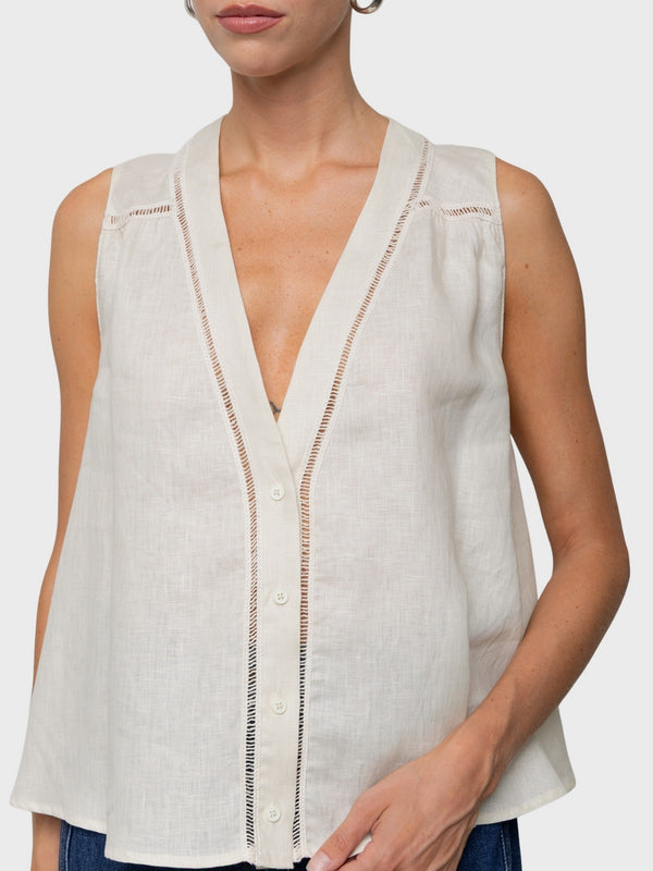 Top camicia smanicato in lino svasato con ricamo cut-out