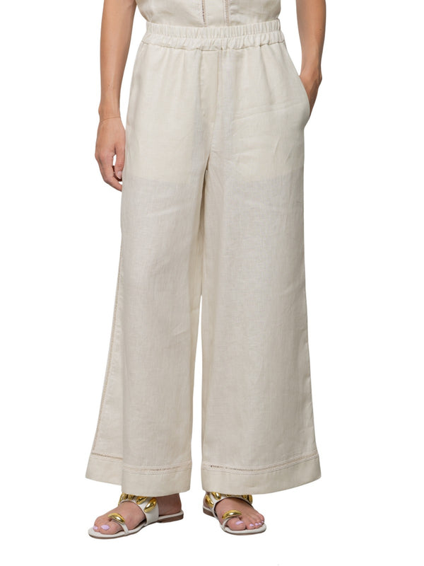 Pantalone in lino con elastico in vita e ricamo laterale